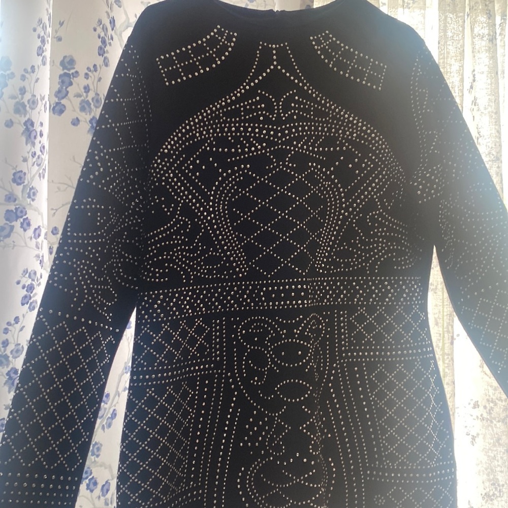 A black shimmer dress with rhinestones